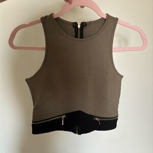 Green and black crop top with gold detail